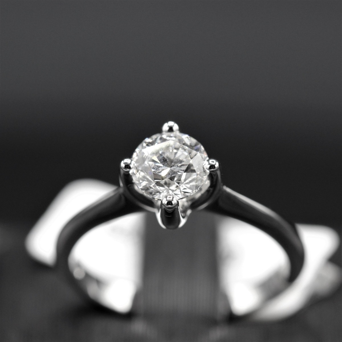 Bague solitaire 4 branches en U